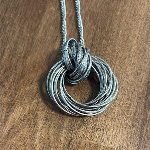 Silver Ringed Pendant with Long Chain